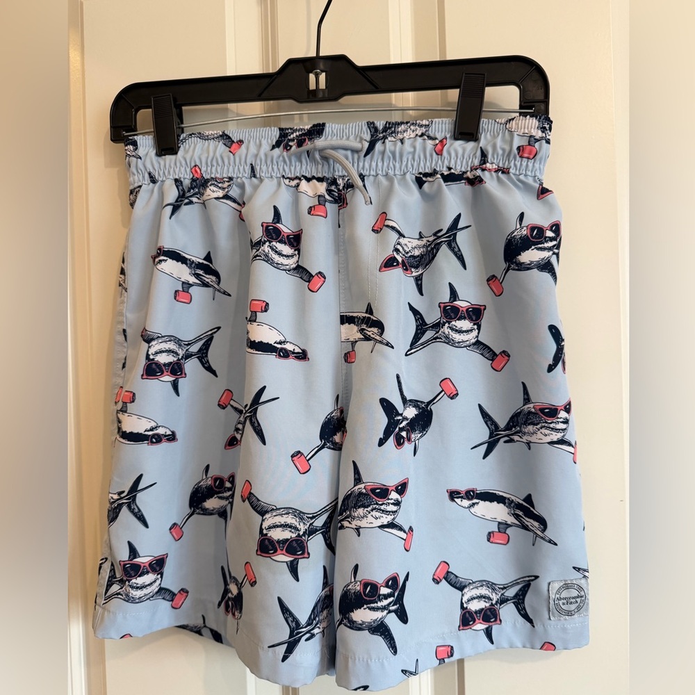 Abercombie kids shark print swim trunks.
